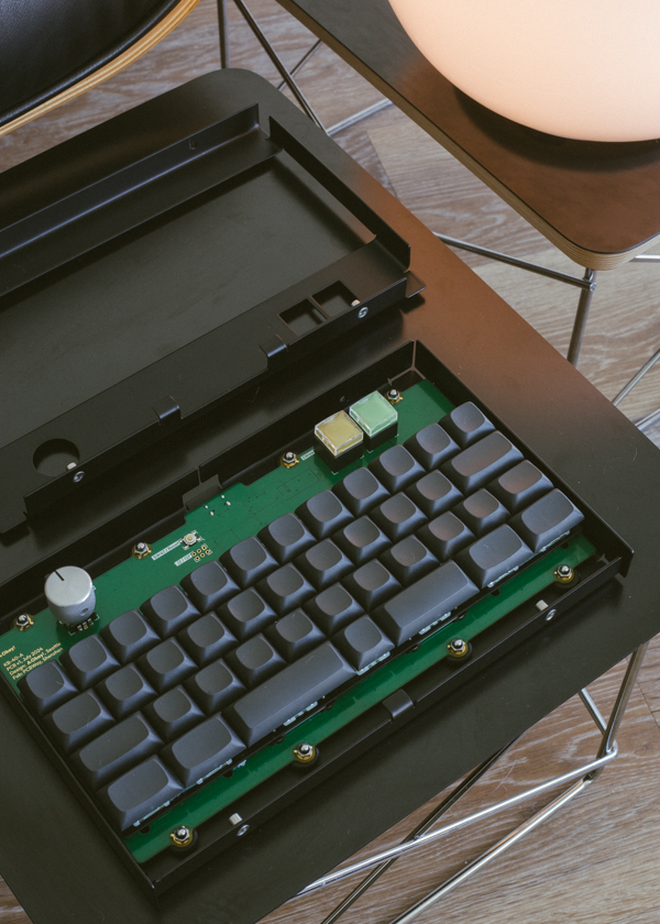 Disassembled parts of keyboard laid out on a table
